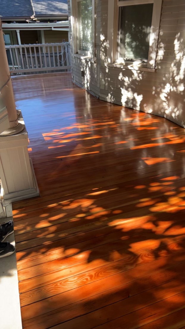 Wraparound porch hardwood refinish